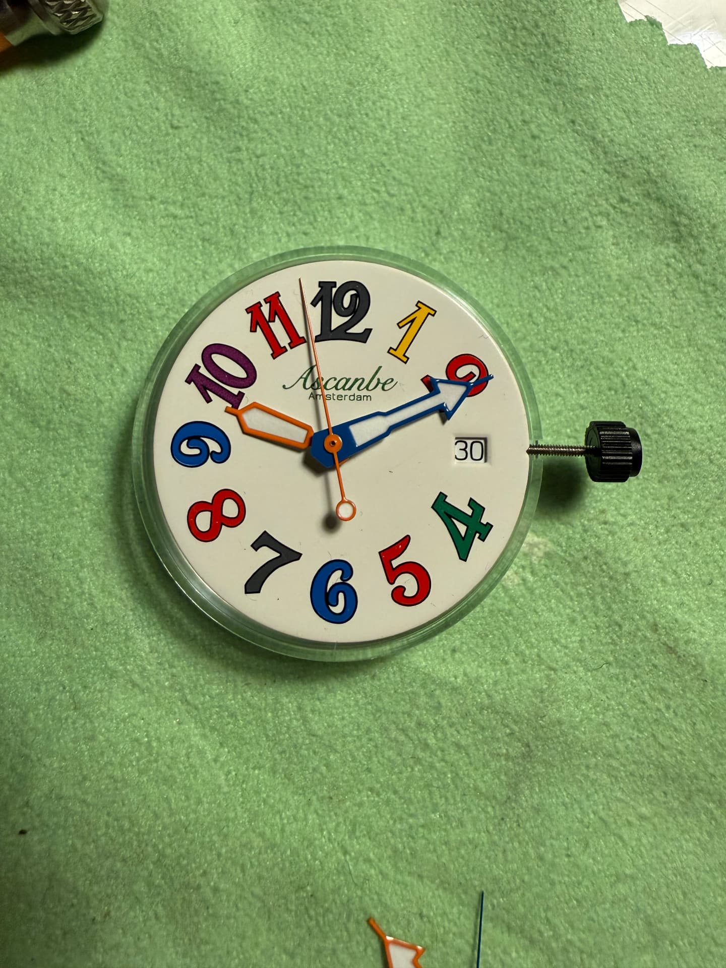 A multicoloured Ascanbe dial on the watchmaker's bench